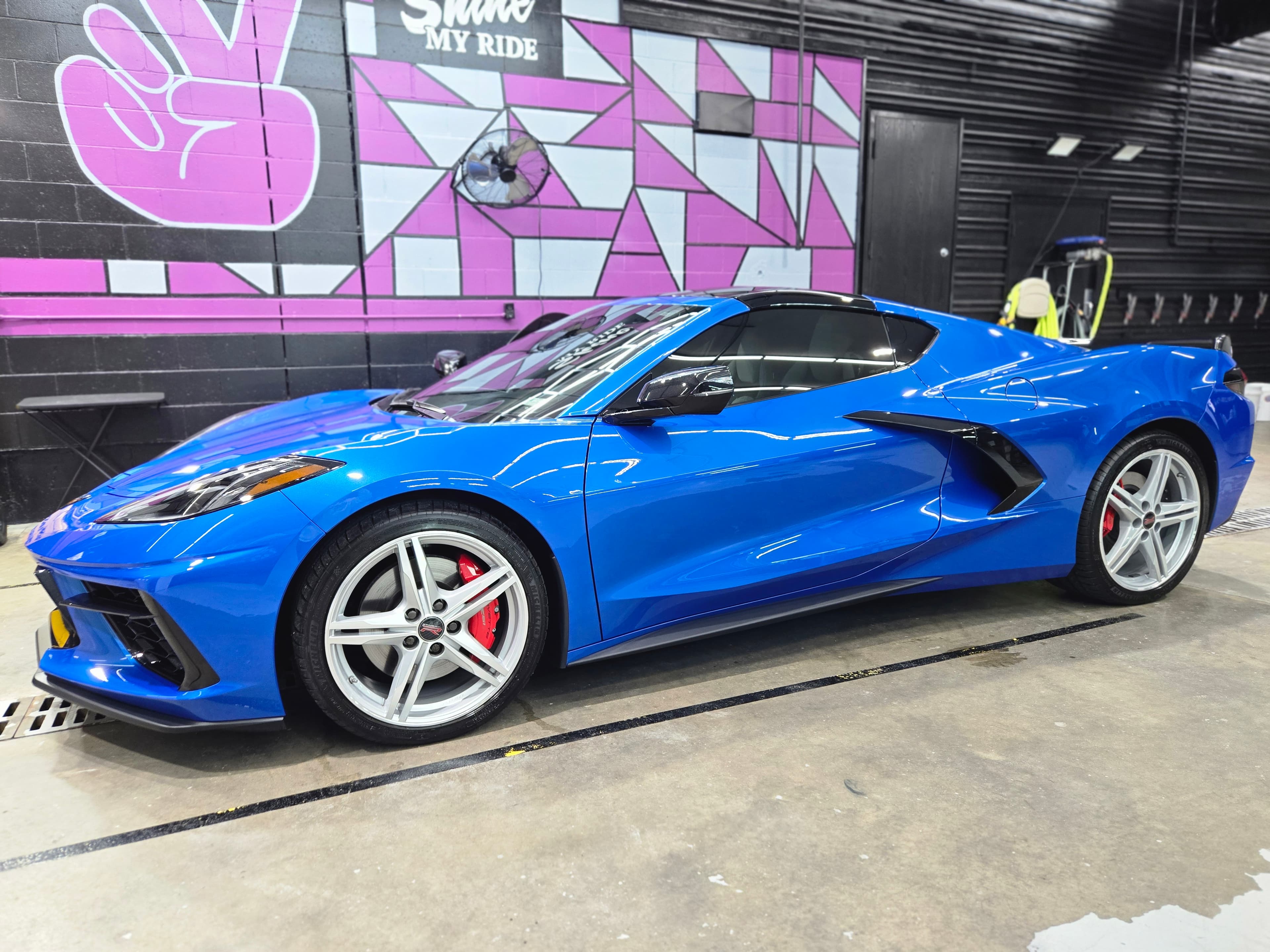 Ceramic coated black sedan with deep gloss finish